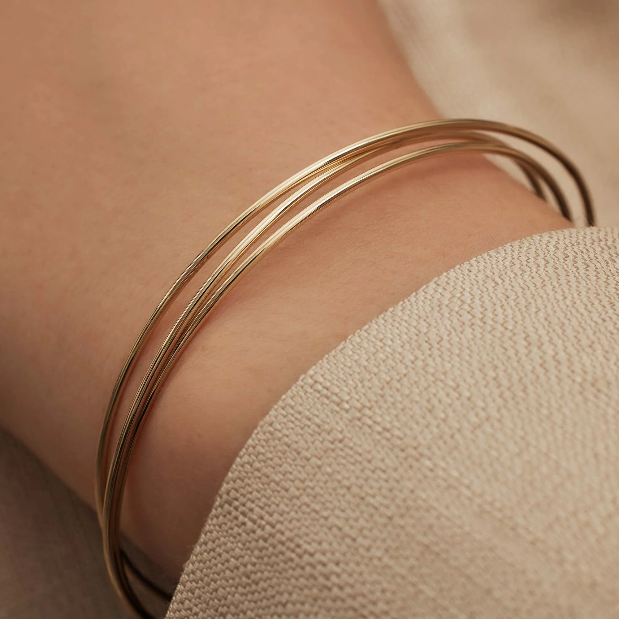 Cour d'Honneur Adora 14 karat gold bangles with 3 bracelets