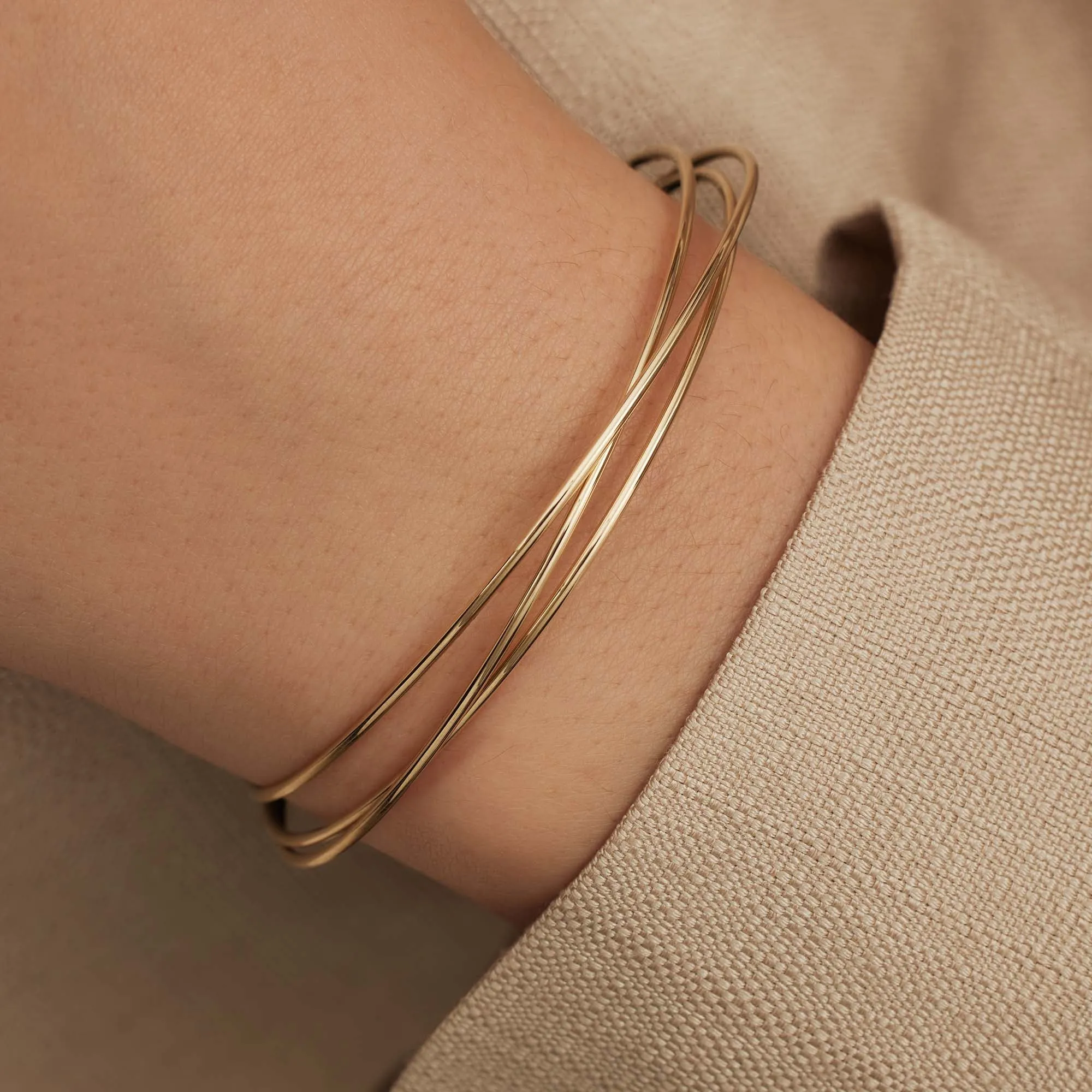 Cour d'Honneur Adora 14 karat gold bangles with 3 bracelets