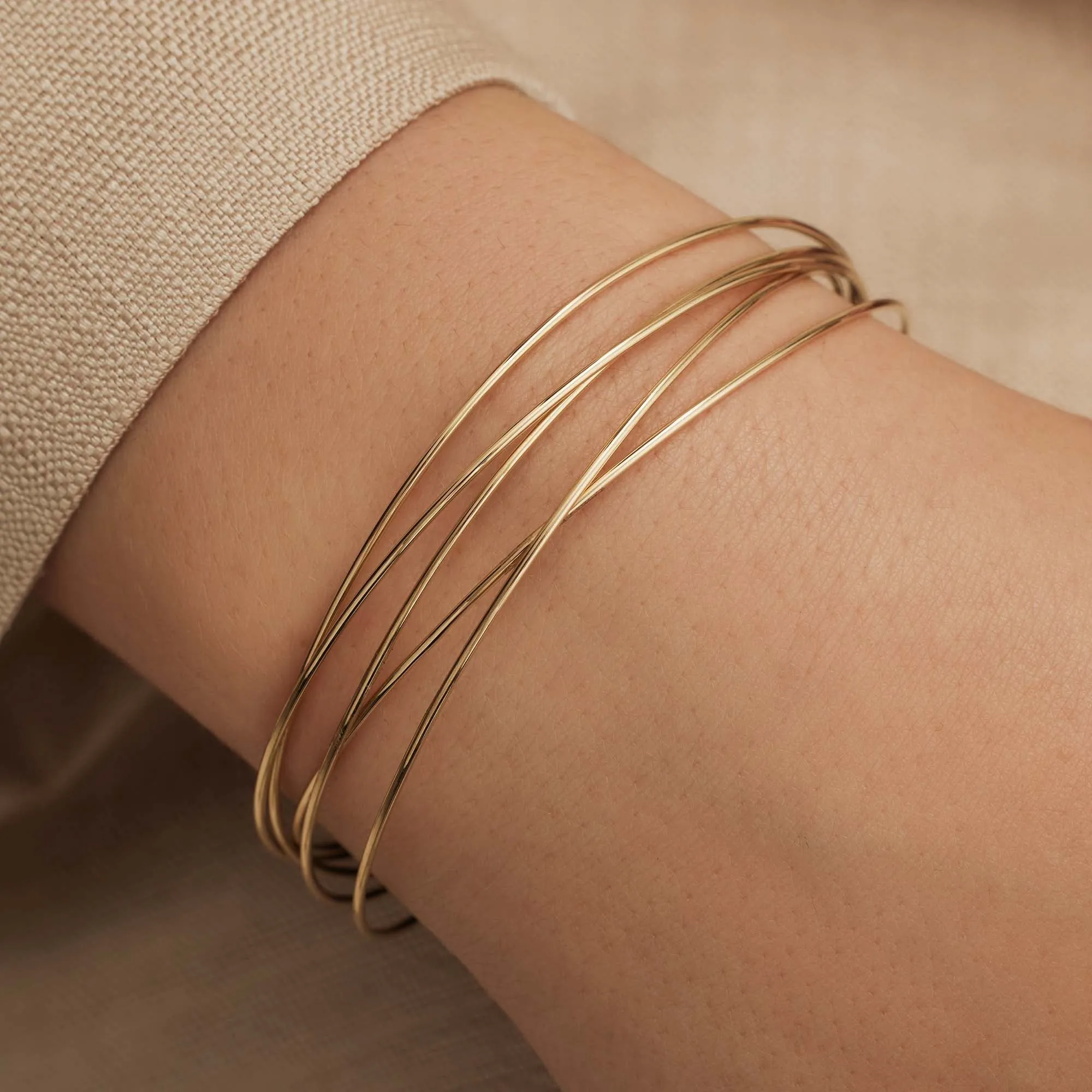 Cour d'Honneur Adora 14 karat gold bangles with 5 bracelets