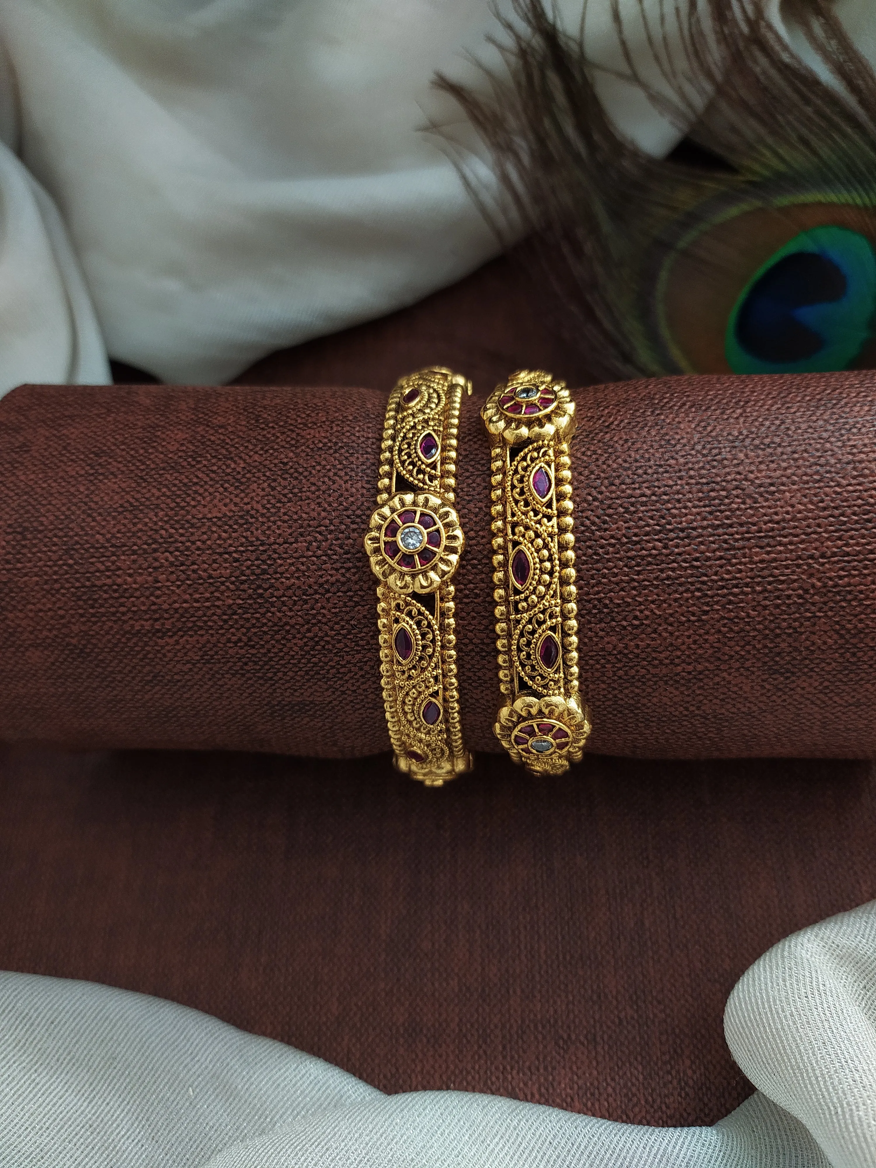 Unveiling Tradition: The Antique Kemp Stone Floral Bangle Collection